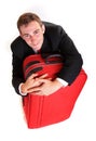 Business man hug luggage Royalty Free Stock Photo