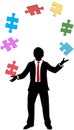 Business man juggling puzzle pieces problems Royalty Free Stock Photo
