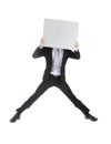 Business man jumping and holding billboard Royalty Free Stock Photo