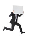 Business man jumping and holding billboard Royalty Free Stock Photo