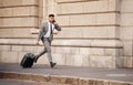 Business man, late and and run on phone call in city with commute and travel to work. Urban, road and professional Royalty Free Stock Photo