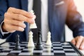 business man leader of a successful business holding the chess i Royalty Free Stock Photo