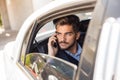 Business man making a call in limousine Royalty Free Stock Photo