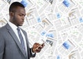 Business man looking at phone against document backdrop Royalty Free Stock Photo
