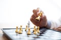 Business men make plans to play chess with Prudence and success