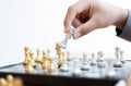 Business men make plans to play chess with Prudence and success