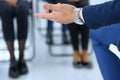 Business man making presentation to group of people. Speaker delivering a seminar to his colleagues or business training Royalty Free Stock Photo