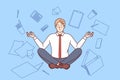 Business man meditates in lotus position and does zen yoga, levitating among office supplies Royalty Free Stock Photo