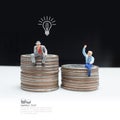 Business man miniature figure concept idea to success business.