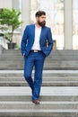 Business man in modern city. Beginning of working day. Motivated for success. Office worker confidently step on stairs Royalty Free Stock Photo