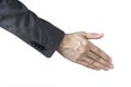 A business man with an open hand ready to shake hands in isolated background Royalty Free Stock Photo