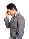 Business man, pain and headache in studio for burnout, stress and risk of bankruptcy on white background. Profile, tired