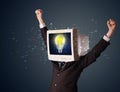 Business man with a pc monitor head and idea light bulb in the d Royalty Free Stock Photo