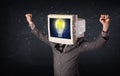 Business man with a pc monitor head and idea light bulb in the d Royalty Free Stock Photo