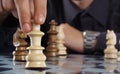 Business man playing chess Royalty Free Stock Photo