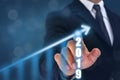 Business man point hand on the top of arrow graph with high rate of growth. The success and growing growth graph in the company or Royalty Free Stock Photo