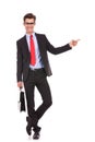 Business man pointing finger to his left side Royalty Free Stock Photo