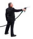 Business man pointing with gas nozzle Royalty Free Stock Photo