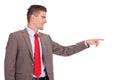 Business man pointing to his side Royalty Free Stock Photo
