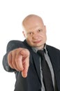 Business man pointing at you against white background Royalty Free Stock Photo