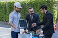 Business Man presenting the solar cell work. Meeting innovative efficient solar panel battery of renewable energy working Royalty Free Stock Photo