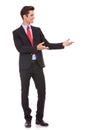 Business man presenting something or inviting Royalty Free Stock Photo