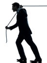 Business man pulling a rope silhouette