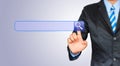 Business man pushing search botton on a touch screen interface Royalty Free Stock Photo