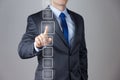 Business man pushing on a touch screen interface Royalty Free Stock Photo