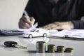 Business man putting a coin on coins stack saving bank and account for his money all in finance accounting concept Royalty Free Stock Photo