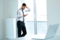 Business Man Reading Something on the Screen of His Cell Phone Royalty Free Stock Photo