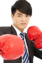 Business man ready to fight with boxing gloves Royalty Free Stock Photo