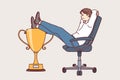 Business man received leadership cup sits in office chair, demonstrating disdain for colleagues