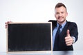Business man recommends a blackboard Royalty Free Stock Photo