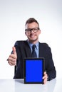 Business man recommends his tablet Royalty Free Stock Photo