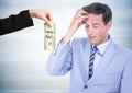Business man refusing money against blurry grey wood panel Royalty Free Stock Photo
