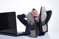 Business man relaxes at the laptop Royalty Free Stock Photo