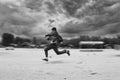 Business man runing in the beach. Motion blur Royalty Free Stock Photo