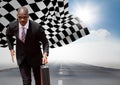 Business man running with briefcase on road against sky with sun and checkered flag Royalty Free Stock Photo