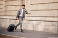 Business man, running late and phone call with travel commute in city for work. Urban, road and professional person with Royalty Free Stock Photo