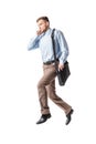 Business man running and speaking by phone Royalty Free Stock Photo