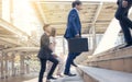 Business man running on steps to work in the morning Royalty Free Stock Photo