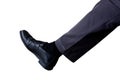 A business man`s foot is stepping on the work impossible to make the work possible. There is a white background. use it for a Royalty Free Stock Photo