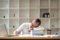 Business man sad tired exhausted frustrated sick ill sleepy employee business man in sit work at office desk with laptop