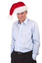 Business Man in Santa Hat with Cheeky Grin Royalty Free Stock Photo