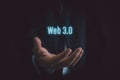 Businessman selecting web 3.0 on virtual screen. Royalty Free Stock Photo