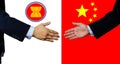 A business man shake each other hand,AEC and China