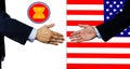 A business man shake each other hand,AEC and USA