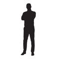 Business man standing with folded arms, isolated vector silhouette. Front view