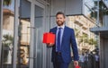 Business man with shopping bag. Handsome smiling confident businessman portrait. Royalty Free Stock Photo